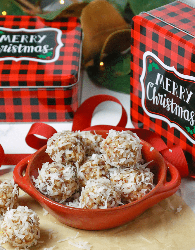 Coconut Date Balls with gift tins are the perfect Christmas treat for friends. A no-bake, easy recipe made with butter, dates, pecans, rice cereal and coconut. This healthy cookie is always a favorite at the holidays.