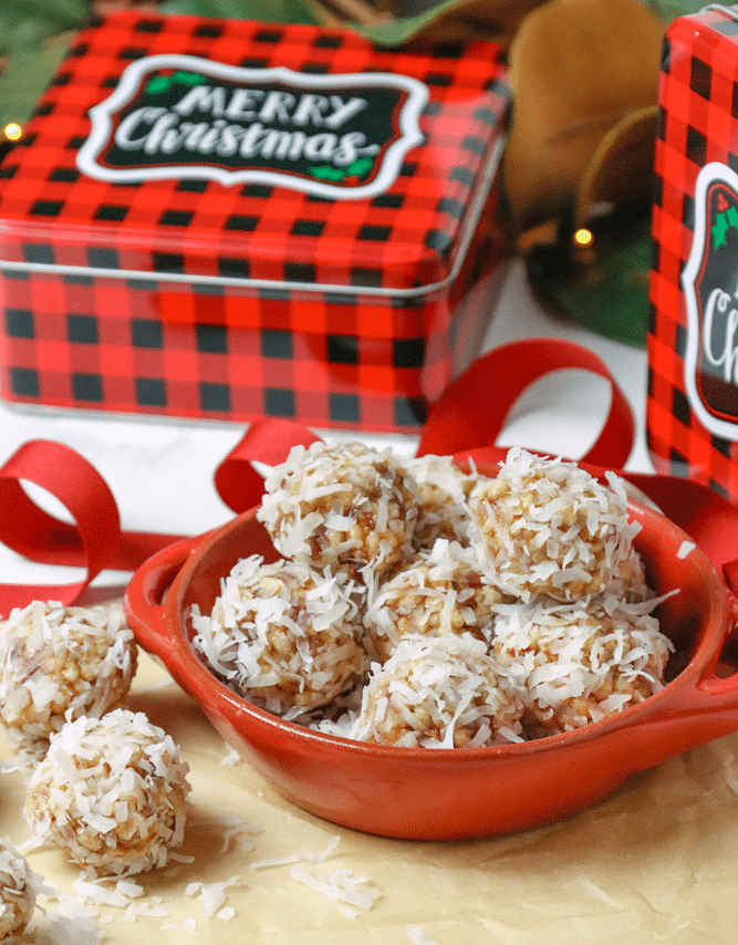 Coconut Date Balls with gift tins are the perfect Christmas treat for friends. A no-bake, easy recipe made with butter, dates, pecans, rice cereal and coconut. This healthy cookie is always a favorite at the holidays.