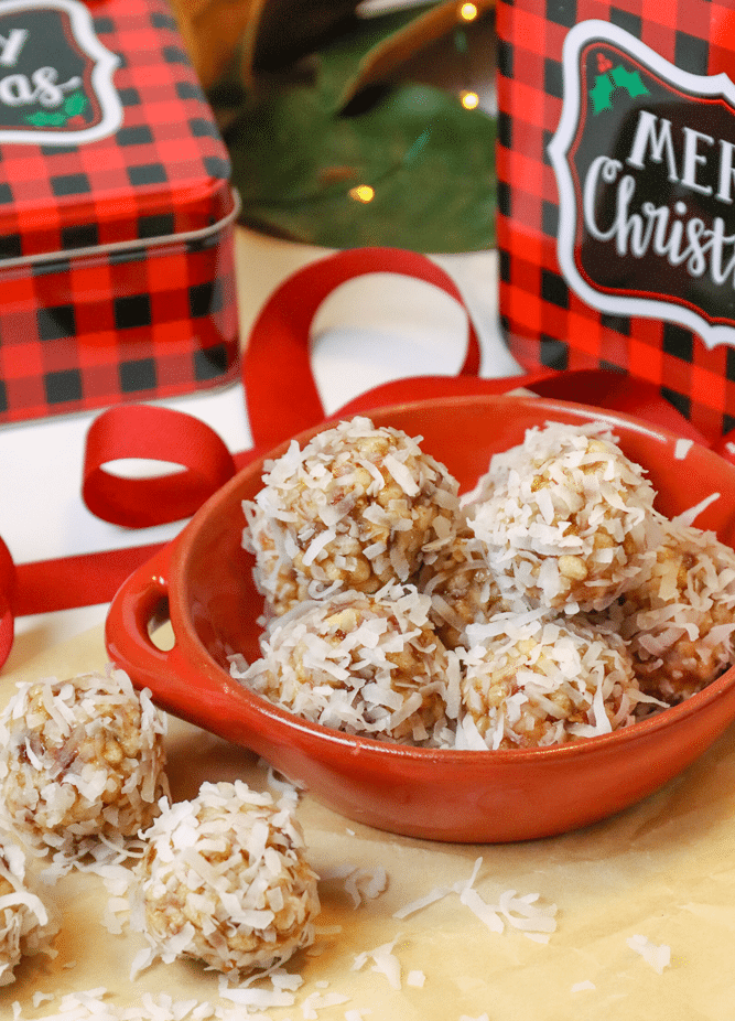 Coconut Date Balls with gift tins are the perfect Christmas treat for friends. A no-bake, easy recipe made with butter, dates, pecans, rice cereal and coconut. This healthy cookie is always a favorite at the holidays.
