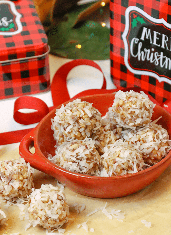 Coconut Date Balls with gift tins are the perfect Christmas treat for friends. A no-bake, easy recipe made with butter, dates, pecans, rice cereal and coconut. This healthy cookie is always a favorite at the holidays.