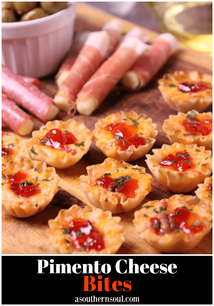 Crispy Phyllo cups filled with pimento cheese then topped with sweet, slightly spicy red pepper jelly makes for delicious appetizer for the holidays, game day or whenever you're entertaining!
