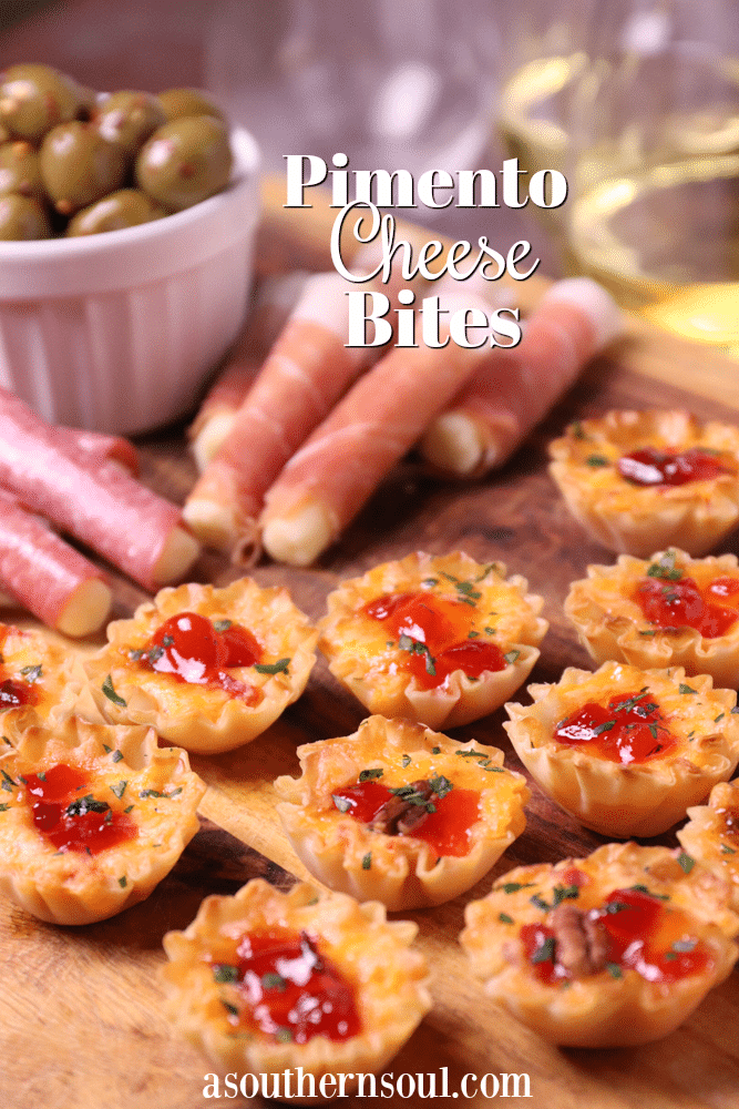 Crispy Phyllo cups filled with pimento cheese then topped with sweet, slightly spicy red pepper jelly makes for delicious appetizer for the holidays, game day or whenever you're entertaining!