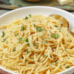 Instant Pot Garlic Parmesan Noodles is comfort food made in 20 minutes. Made with butter, garlic, chicken stock, pasta, Parmesan salt and pepper, this easy recipe is perfect for a week night meal when you've got to get supper on the table in a hurry.