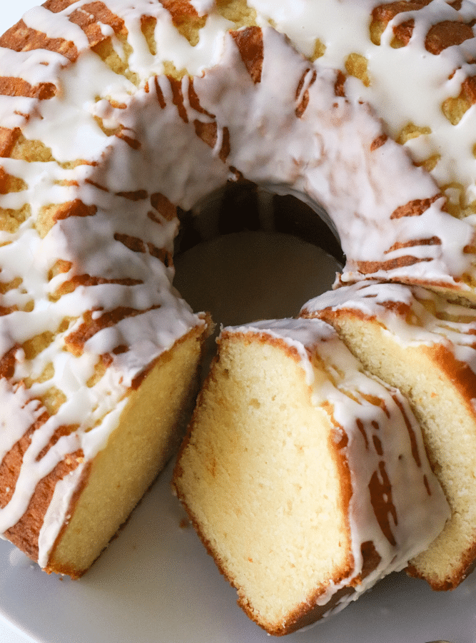 Orange Pound Cake made with fresh squeezed orange juice and zest is a delicious dessert to enjoy any time of year! This buttery, sweet cake is surprisingly easy to make and and will disappear quickly.