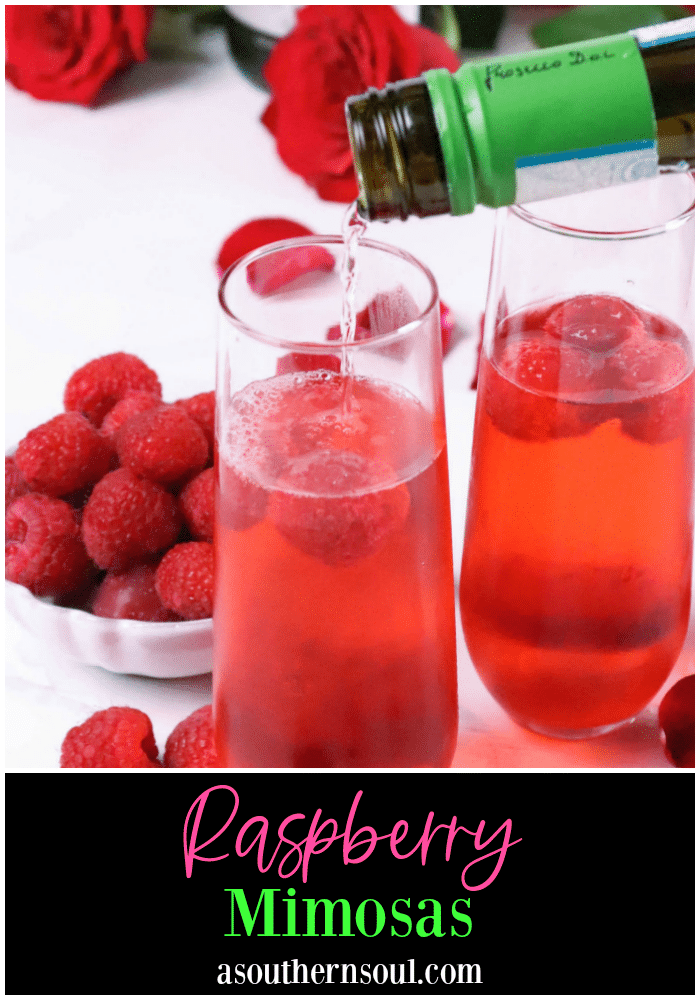 Raspberry Mimosas made with fresh berries, raspberry sorbet, grenadine and prosecco made a festive drink for any occasion!