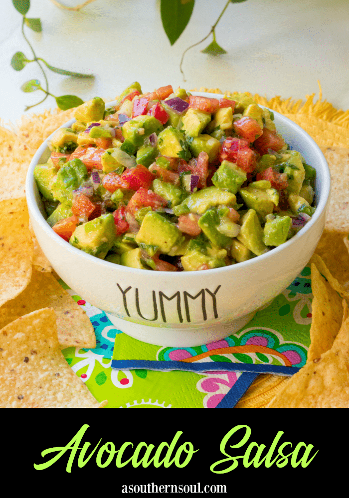 Avocado Salsa made with fresh avocado, tomatoes, jalapenos, red onion then tossed in a light dressing of lime, olive oil, garlic powder, salt and pepper. This is the perfect dip to serve at your next party and it's also delicious served with fish or chicken.