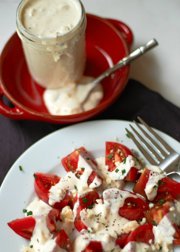 Easy Blue Cheese Dressing made with crumbled blue cheese, sour cream, mayonnaise, garlic powder, cream, chives, salt and pepper is so good! Drizzled it on lettuce for an amazing salad or serve as a dip with fresh veggies.