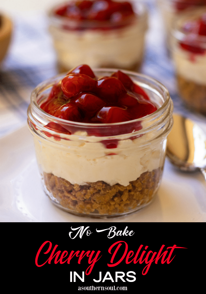 No Bake Cherry Delight In Jars is a yummy, easy to make dessert. A crust made with crushed graham crackers, butter and sugar is layered into small jars then topped with a mixture of cream cheese, powdered sugar and fresh whipped cream all topped with cherry pie filling.