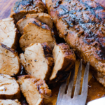 Grilled Pork Tenderloin marinated in olive oil, balsamic vinegar, dried italian seasoning and garlic is tender and juicy. This easy to make recipe is great for a weeknight meal or when you're having guests.