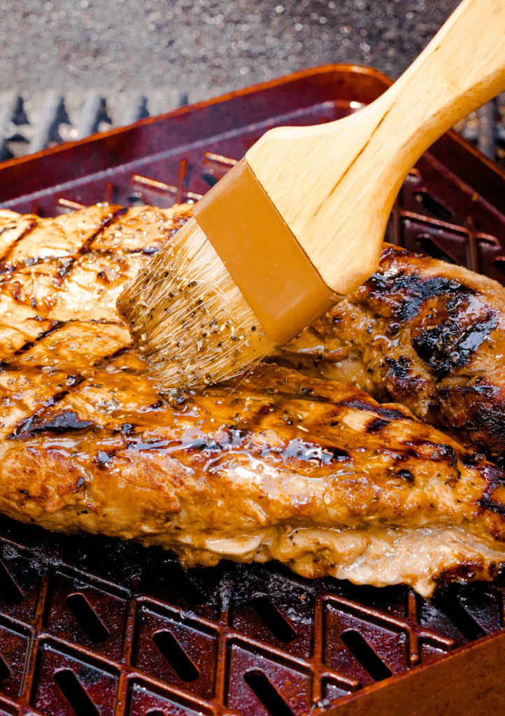 Grilled Pork Tenderloin marinated in olive oil, balsamic vinegar, dried italian seasoning and garlic is tender, juicy, and being grilled to absolute perfection.