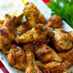 Air Fryer chicken wings are crispy, crunch and juicy. Made with chicken wings, Montreal Steak seasoning, garlic powder and salt. They are super yummy served with cool ranch dip and Texas Pete hot sauce.