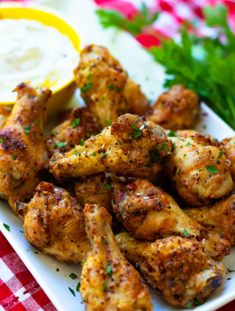 Air Fryer chicken wings are crispy, crunch and juicy. Made with chicken wings, Montreal Steak seasoning, garlic powder and salt. They are super yummy served with cool ranch dip and Texas Pete hot sauce.