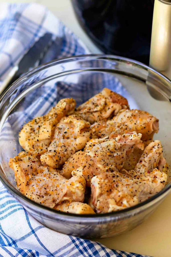 Air Fryer chicken wings are crispy, crunch and juicy. Made with chicken wings, Montreal Steak seasoning, garlic powder and salt. They are super yummy served with cool ranch dip and Texas Pete hot sauce.