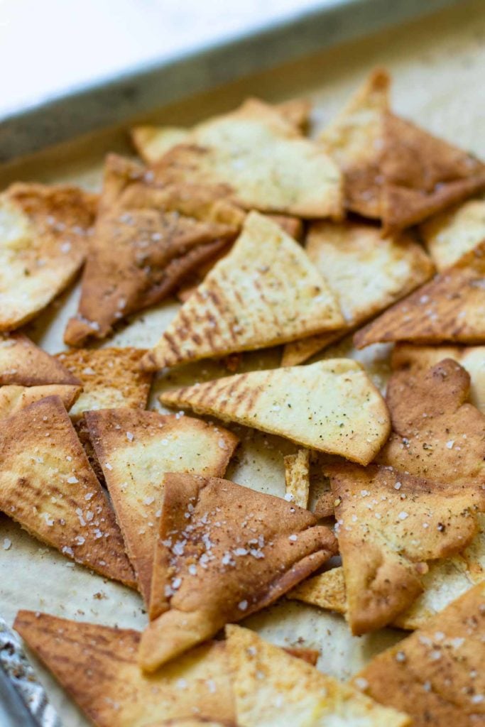 Homemade Pita chips made with store bought pita bread, olive oil, salt or za'atar. They are perfect for all your dips or for snacking.