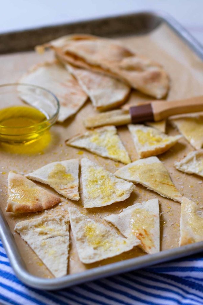 Homemade Pita chips made with store bought pita bread, olive oil, salt or za'atar. They are perfect for all your dips or for snacking.