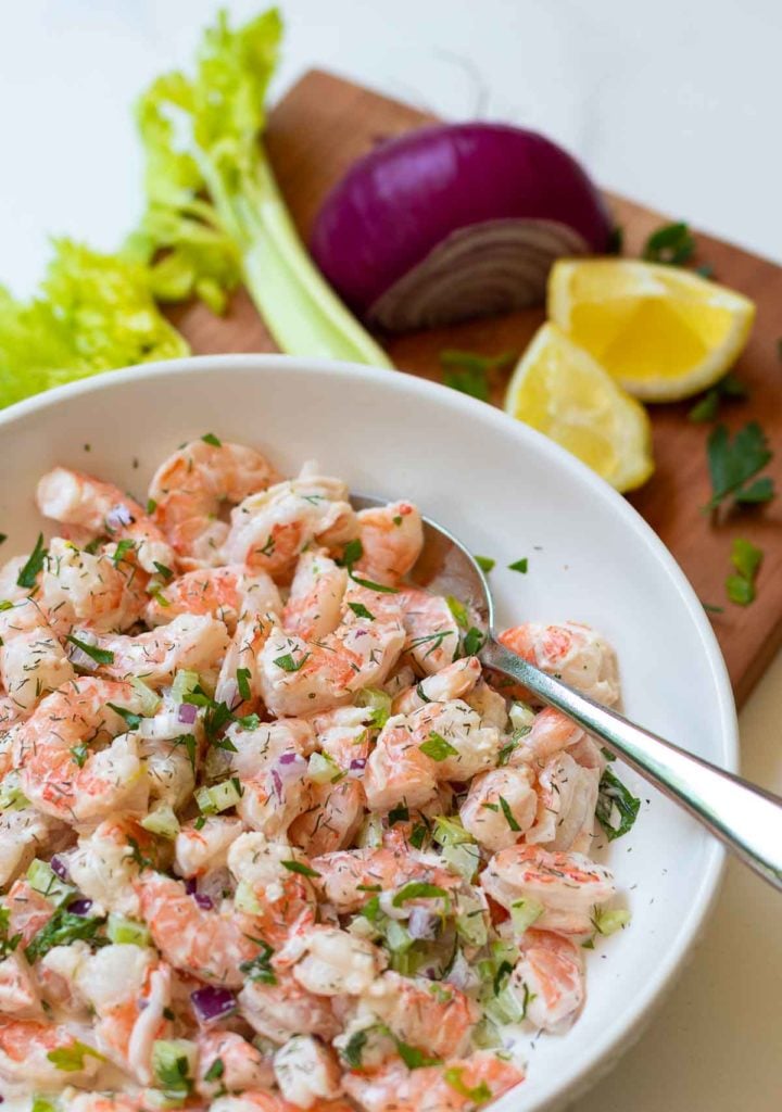 Shrimp Salad made with cooked shrimp, celery, red onion with fresh dill and parsley tossed in a lemony mayonnaise dressing is so easy to make. This cool and refreshing salad is pefect as an appetizer, lunch or even a main dish at supper.