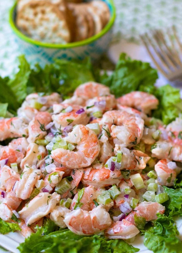 Shrimp Salad made with cooked shrimp, celery, red onion with fresh dill and parsley tossed in a lemony mayonnaise dressing is so easy to make. This cool and refreshing salad is pefect as an appetizer, lunch or even a main dish at supper.