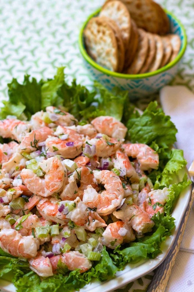 Shrimp Salad made with cooked shrimp, celery, red onion with fresh dill and parsley tossed in a lemony mayonnaise dressing is so easy to make. This cool and refreshing salad is pefect as an appetizer, lunch or even a main dish at supper.