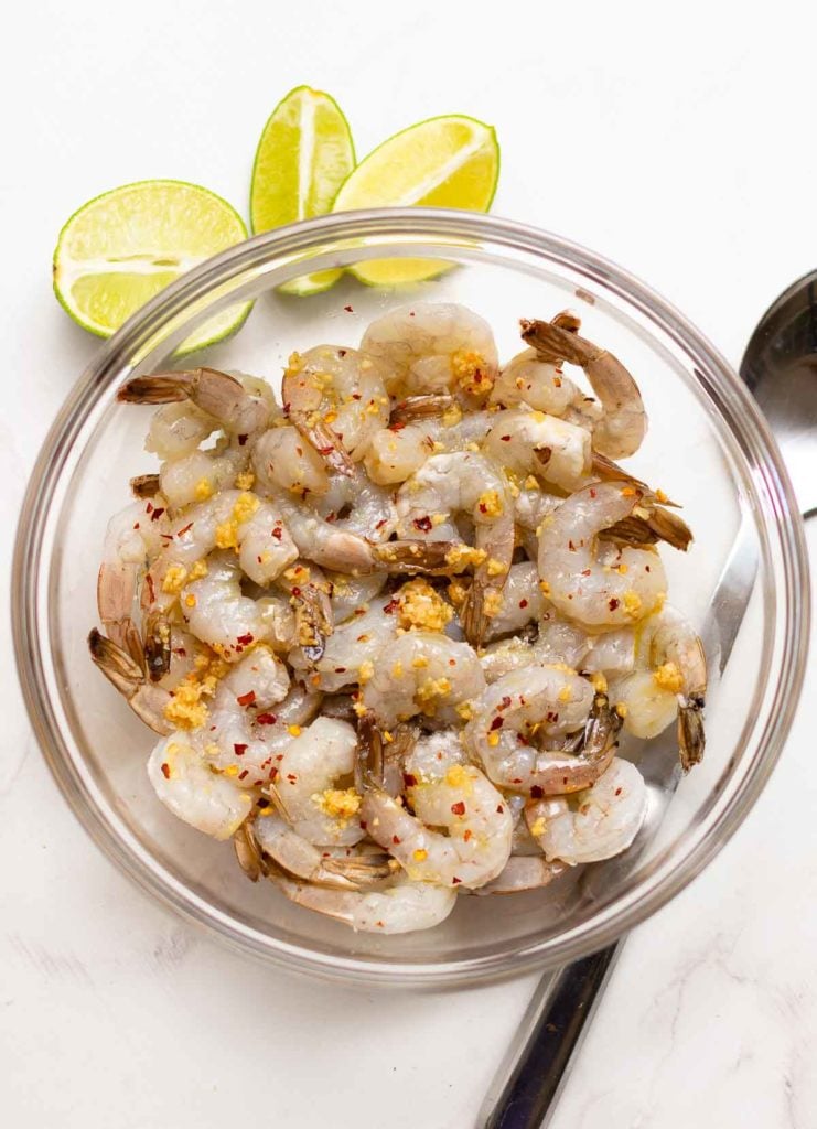 Garlic Honey Lime Shrimp are easy to make in just 15 minutes! Made with peeled, deveined shrimp, olive oil, red pepper flakes, salt, pepper, honey, and fresh lime juice. Perfect for an appetizer or a main dish.