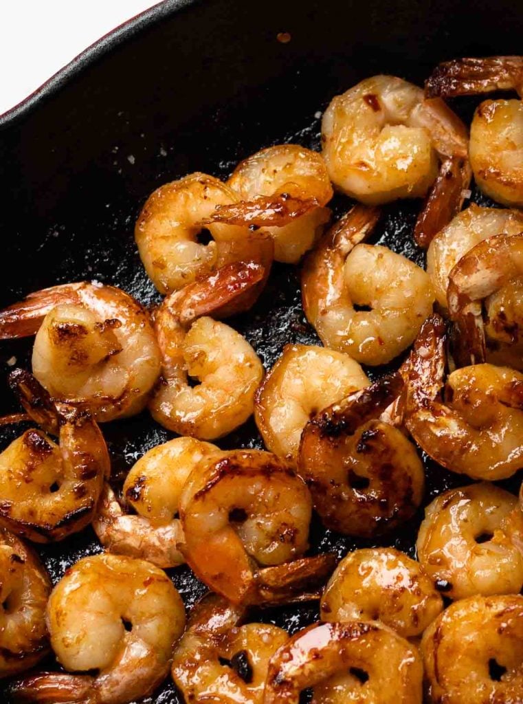 Garlic Honey Lime Shrimp are easy to make in just 15 minutes! Made with peeled, deveined shrimp, olive oil, red pepper flakes, salt, pepper, honey, and fresh lime juice. Perfect for an appetizer or a main dish.