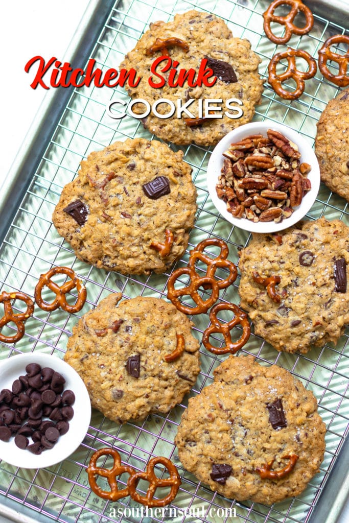 Kitchen Sink Cookies are loaded with sweet, savory and salty goodness! Made with butter, sugar, flour, oats, dark chocolate, chocolate chips, coconut, pecans and pretzels. This is one cookie that that has something for everyone!