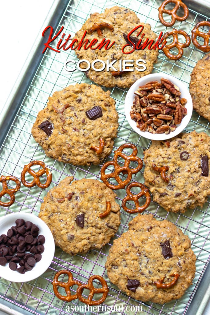 Kitchen Sink Cookies are loaded with sweet, savory and salty goodness! Made with butter, sugar, flour, oats, dark chocolate, chocolate chips, coconut, pecans and pretzels. This is one cookie that that has something for everyone!