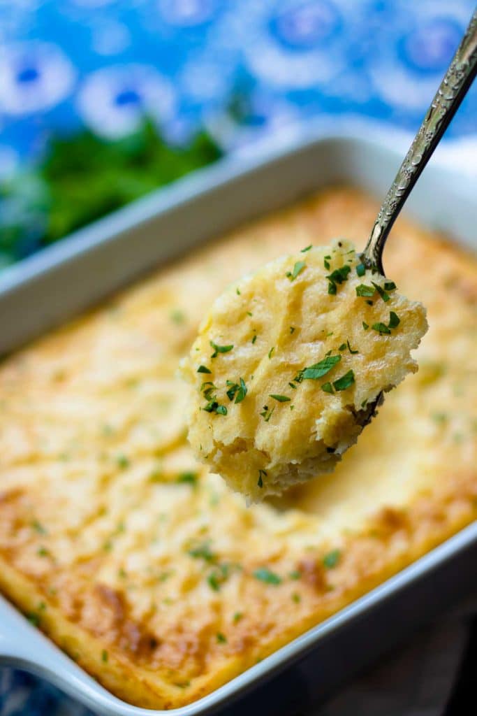 Smoked Gouda Cheese Grits Casserole is full of deep, rich flavors. Made with quick cooking grits, shredded smoked gouda cheese, butter, half and half, red pepper flakes and salt. The perfect side dish for grilled meats and fish or anytime you need the ultimate side dish.