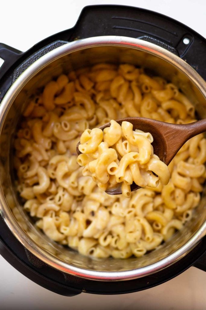 Instant Pot Pepper Jack Mac and Cheese scooped with a spoon.