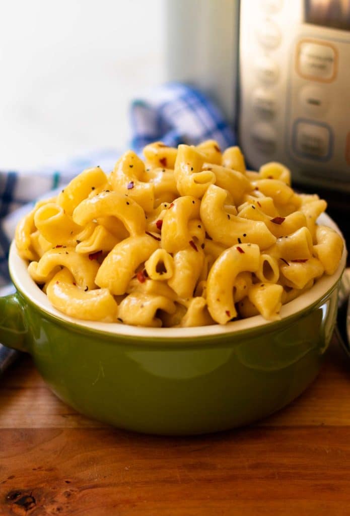 Pepper Jack Mac and Cheese in green bowl made in Instant Pot