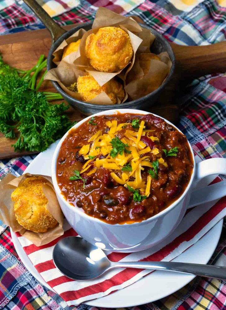 Bowl of Award Winning Southern Soul Chili with corn bread muffins.