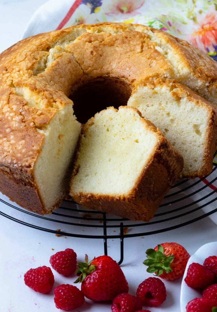 Slices of tender, Southern Pound Cake with strawberries and raspberries.