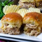 Mississippi Chicken cooked in the crock pot made into sliders with cheese and baked in the voen.