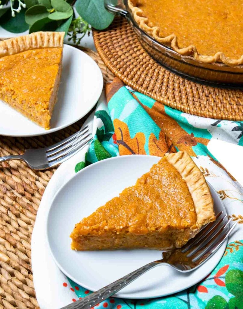 Cut slice on plate with fork of Sweet Potato Pit.