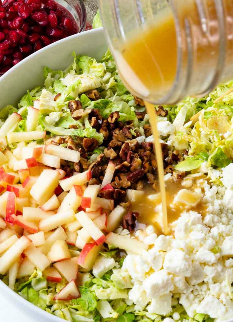 Honey Mustard Dressing drizzled over Brussels Sprouts Slaw
