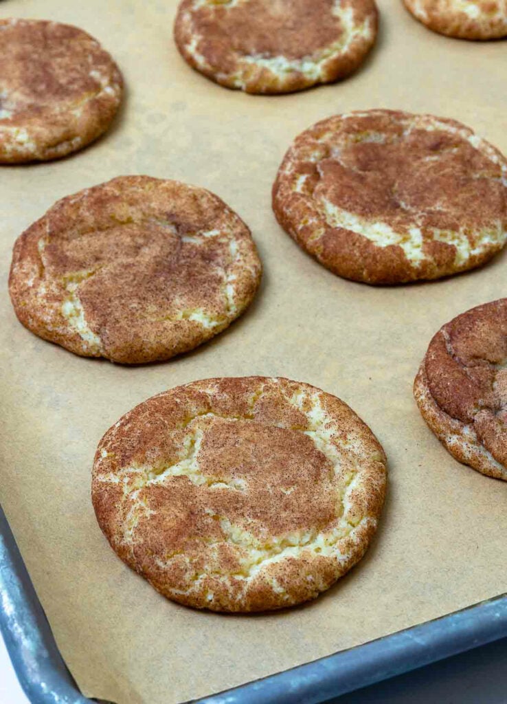The Best Snickerdoodle Cookies on a baking sheet. Tender and delicious!