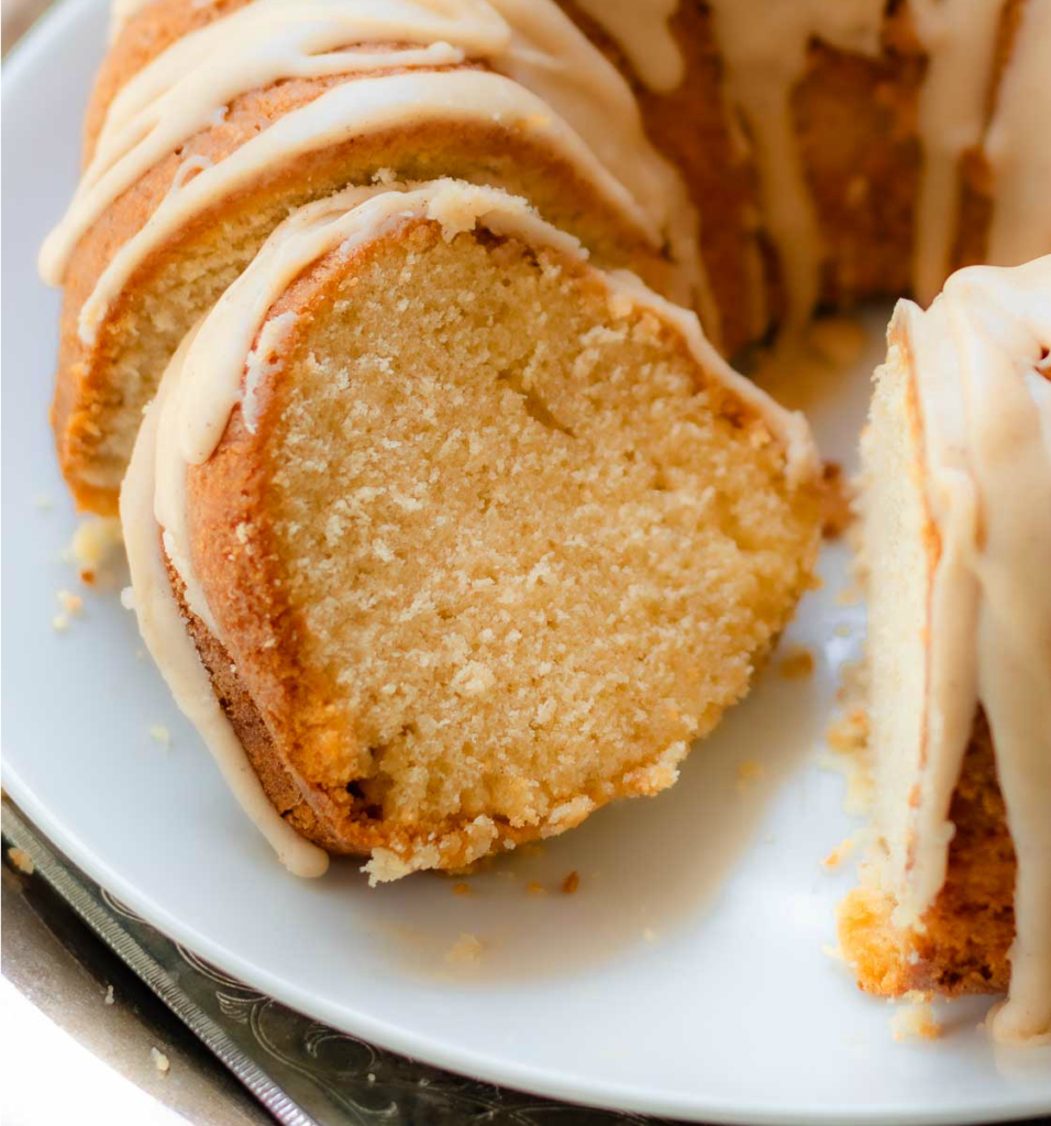 Buttermilk Pound Cake with brown butter icing sliced.