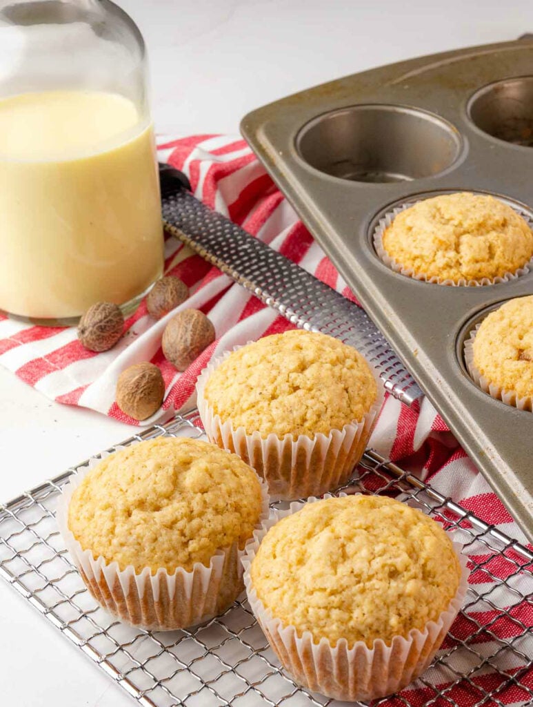 Eggnog Muffins on a muffin tin unglazed.