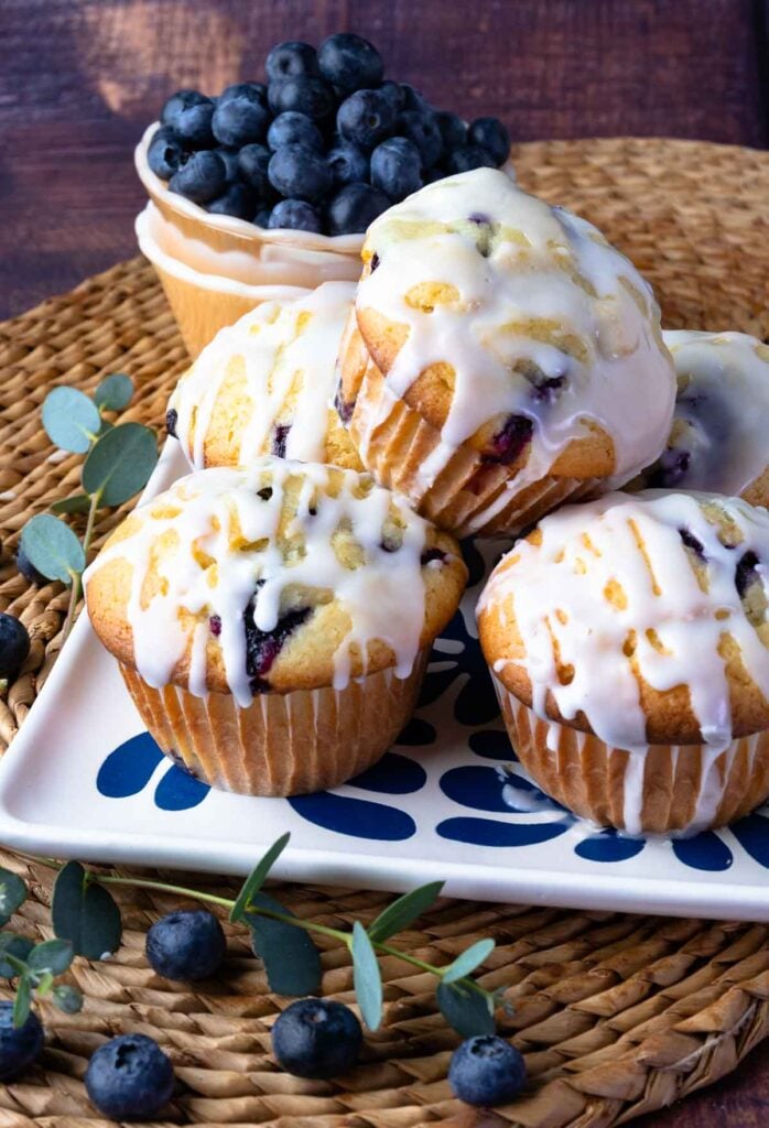 This easy, baked-from-scratch recipe makes the BEST Blueberry Sour Cream Muffins, each one having a pop of fresh lemon flavor. Soft, tender muffins loaded with juicy blueberries topped with a sweet lemony glaze are sure to become everyone’s favorite homemade treat!