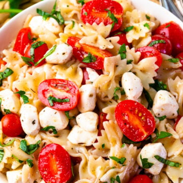 Ripe tomatoes and mozzarella pearls make the Best Caprese Pasta Salad.