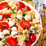 A bowl full of the best Caprese Pasta salad is fresh and easy to make.
