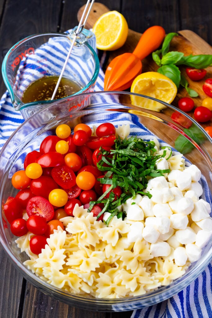 Fresh ingredients make Caprese Pasta Salad with a light dressing easy to make.