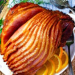 Easy to make orange pepper jelly glazed ham for the holidays.