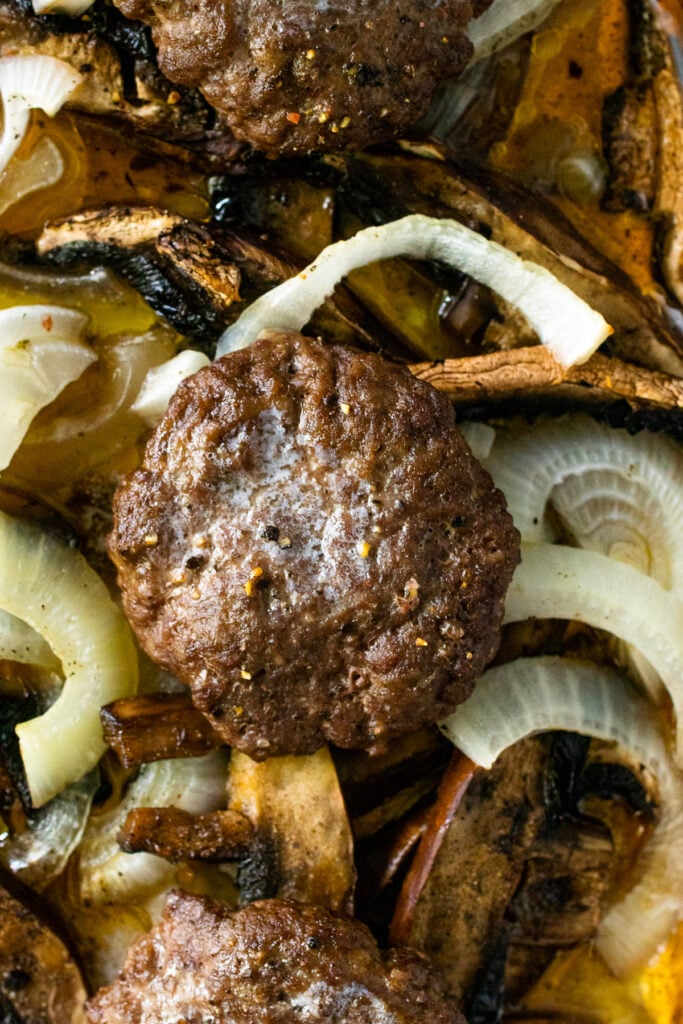 Sheet pan hamburger steak with onions and mushrooms make a one pan meal.