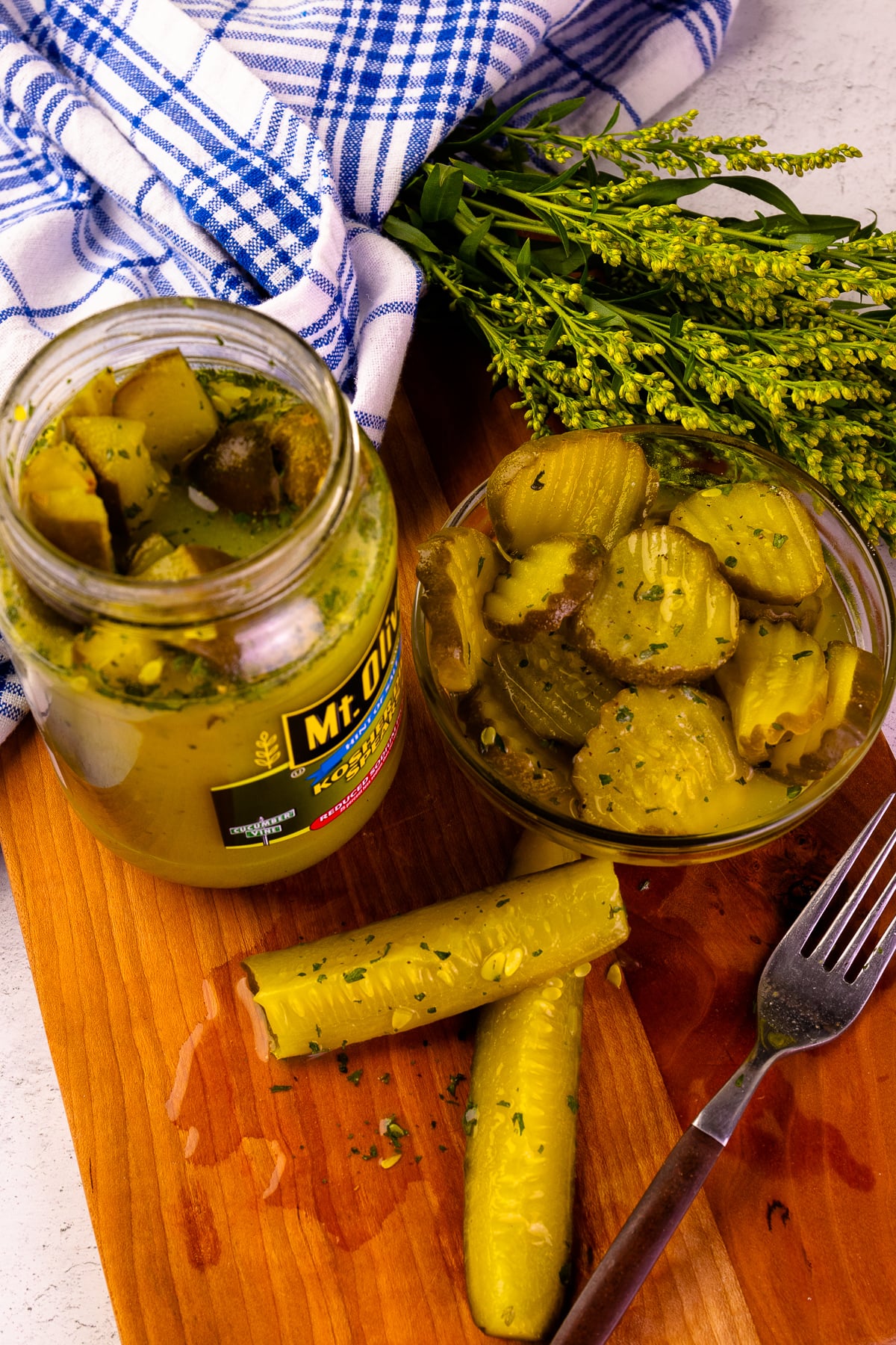 Dill pickle spears and pickle chips turned into Ranch Dill Pickles.