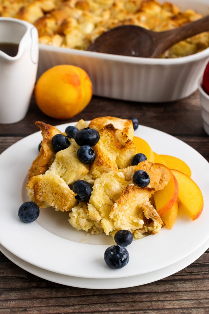 French Toast Bread Pudding with berries and peaches.