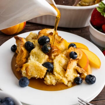 French Toast Bread Pudding with syrup pour.