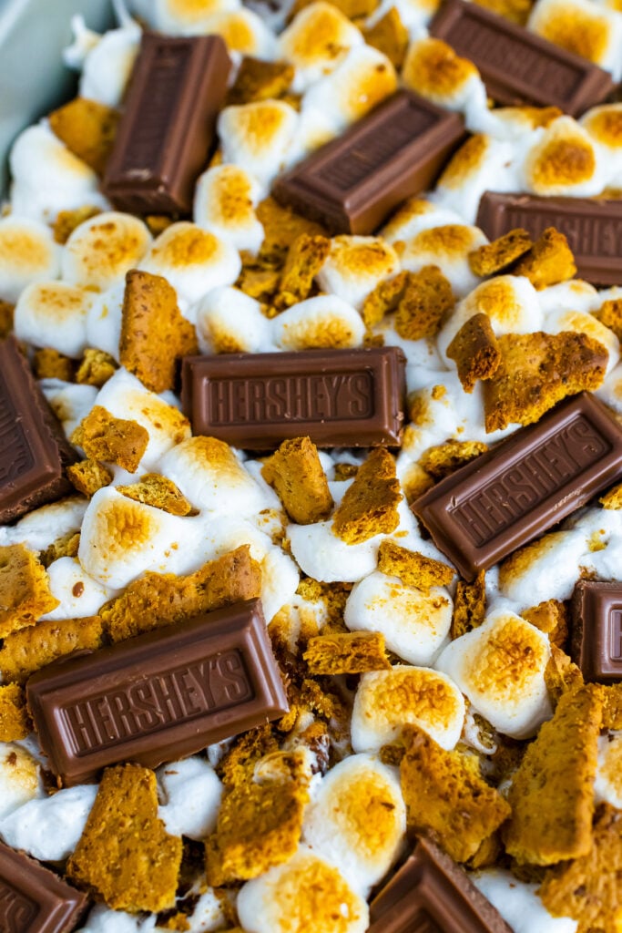 Hersey chocolate pieces layered onver marshmallows and graham crackers.