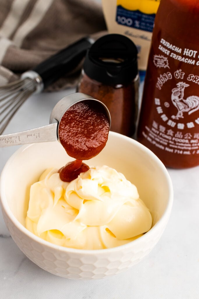 Mayonnaise, hot sauce and chili powder for Spicy Mayo Sauce.