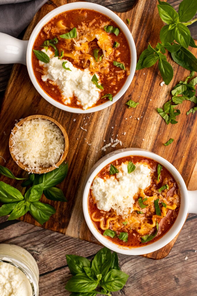 Two white bowls filled with Lasagna Soup