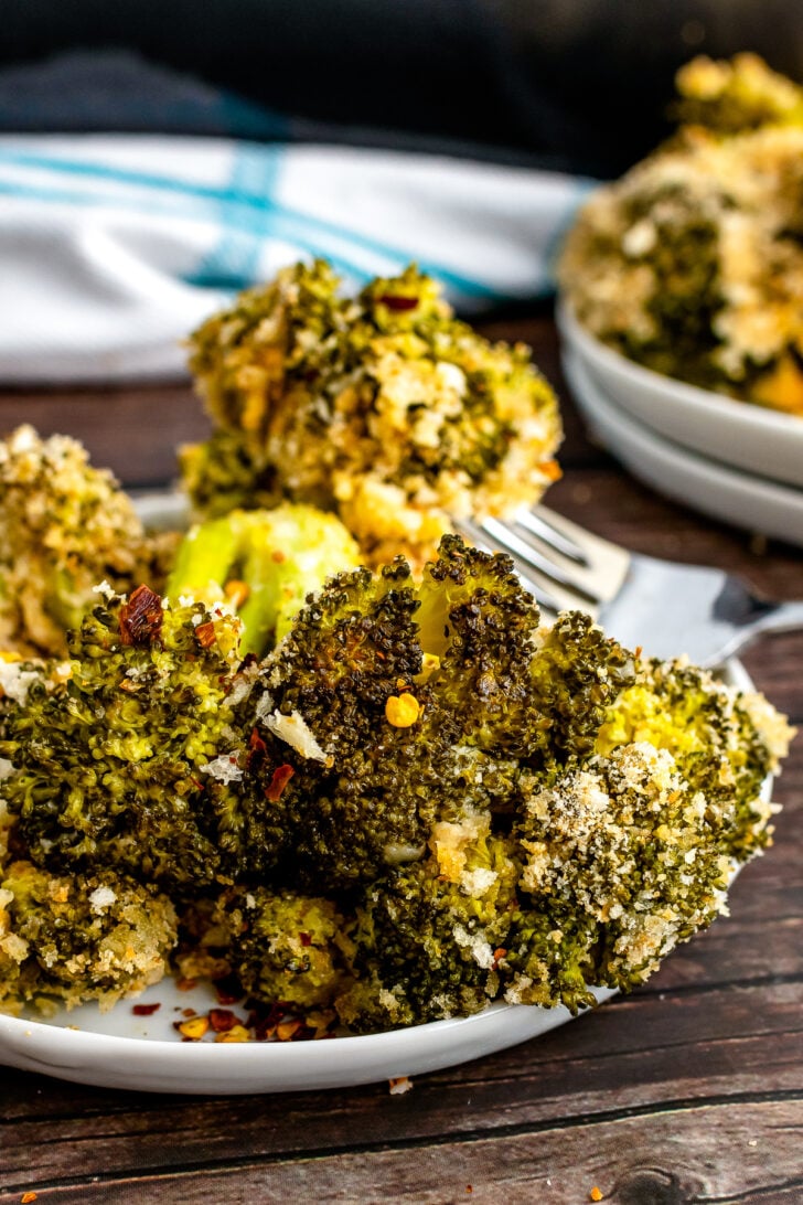 Perfectly baked Broccoli Casserole served on a white plate.